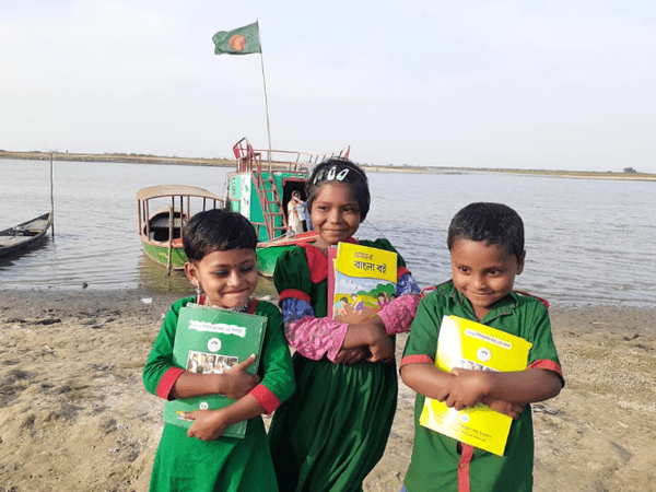 children with books in hand